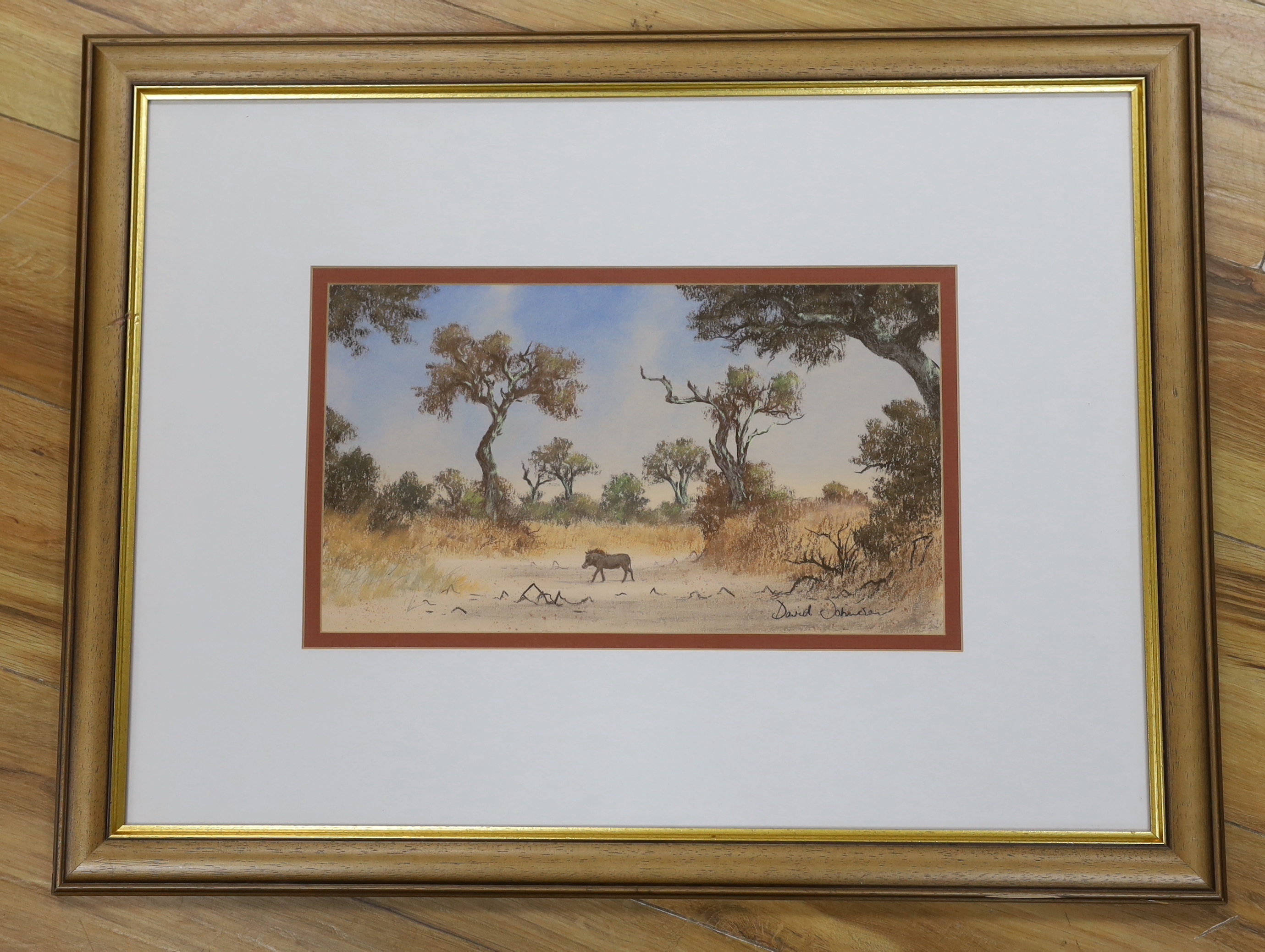 David Johnson (South African b.1958), pastel, Boar in a landscape, signed, 37cm x 21cm